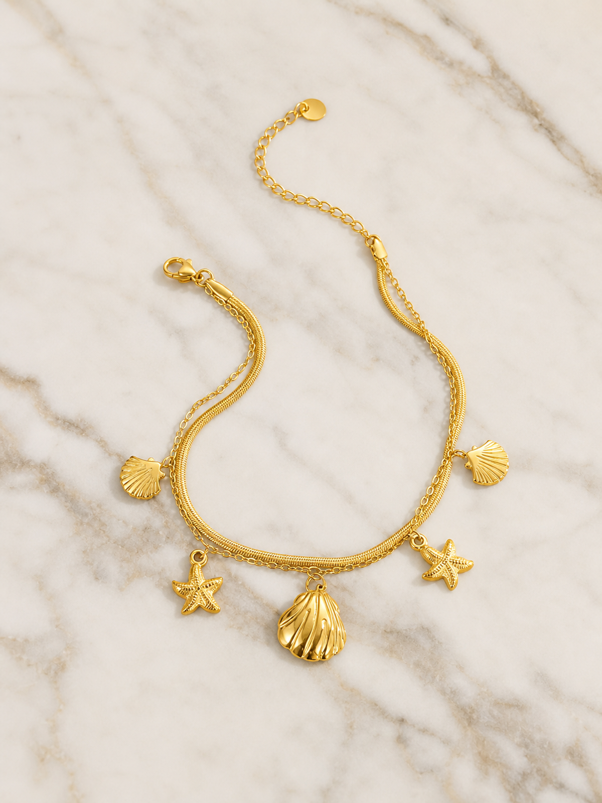 Bracelet de Cheville Mélina – Chaîne Dorée Coquillages & Étoiles Femme | Acier Inoxydable Waterproof