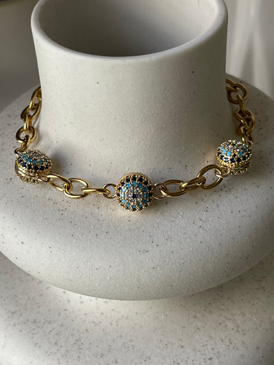 Bracelet Nazar – Médaillons Œil Porte-Bonheur Pavés de Zircons en Acier Inoxydable Doré