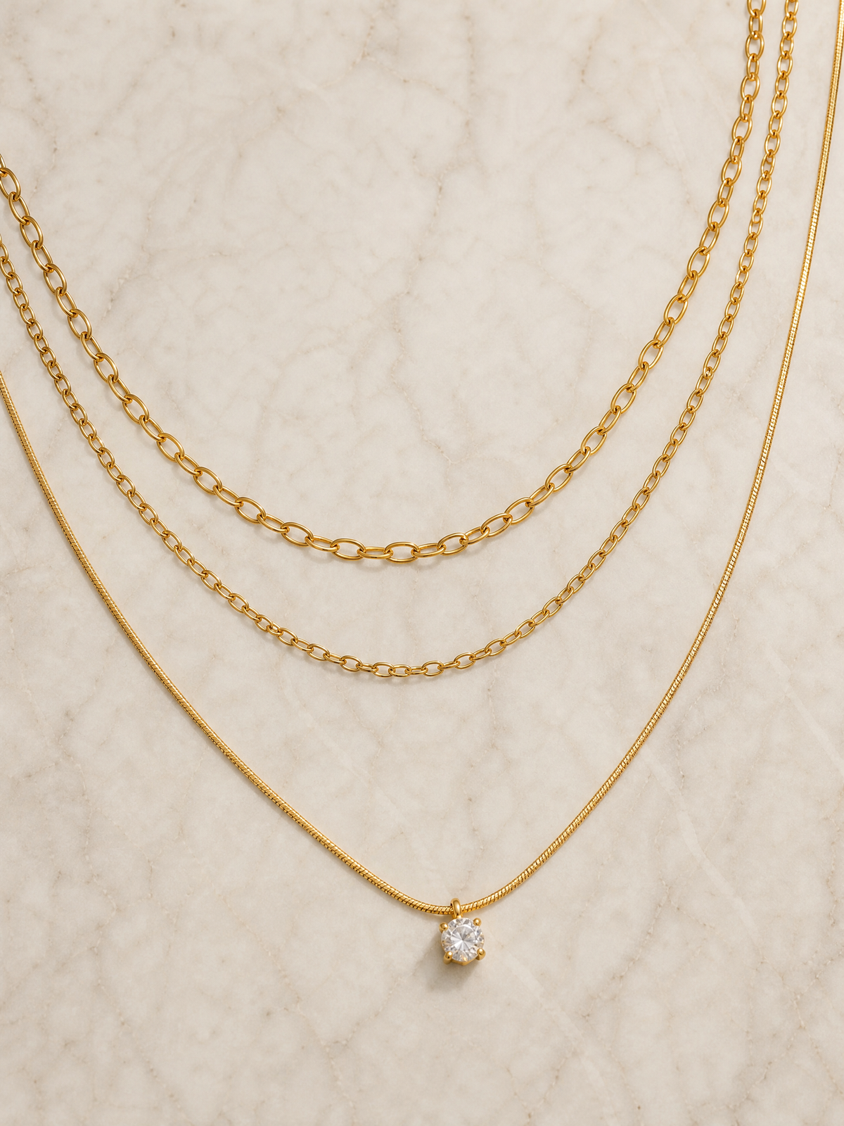 Collier Sérénade – Triple Rang & Solitaire Zircon | Acier Inoxydable 18K